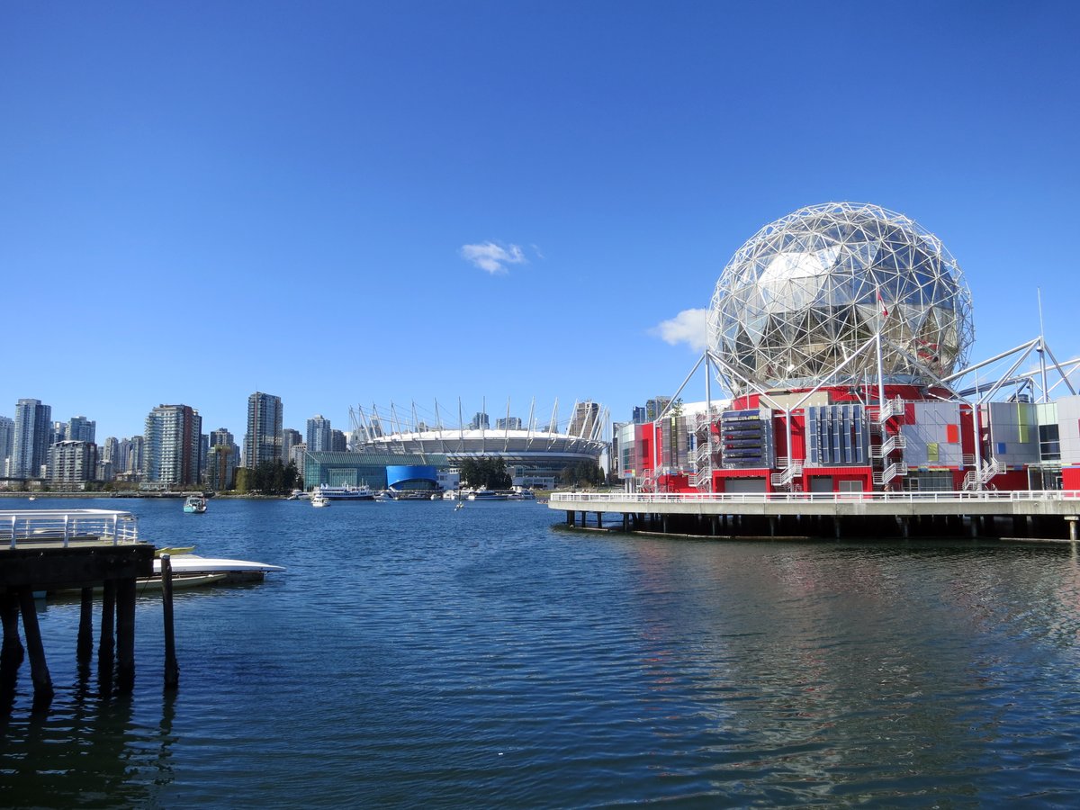Science World geodesic dome at night with illuminated reflections