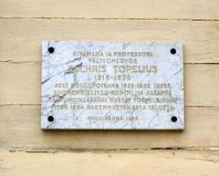 Plaque honoring Finnish author Zacharias Topelius on the Toppelius House wall in Oulu