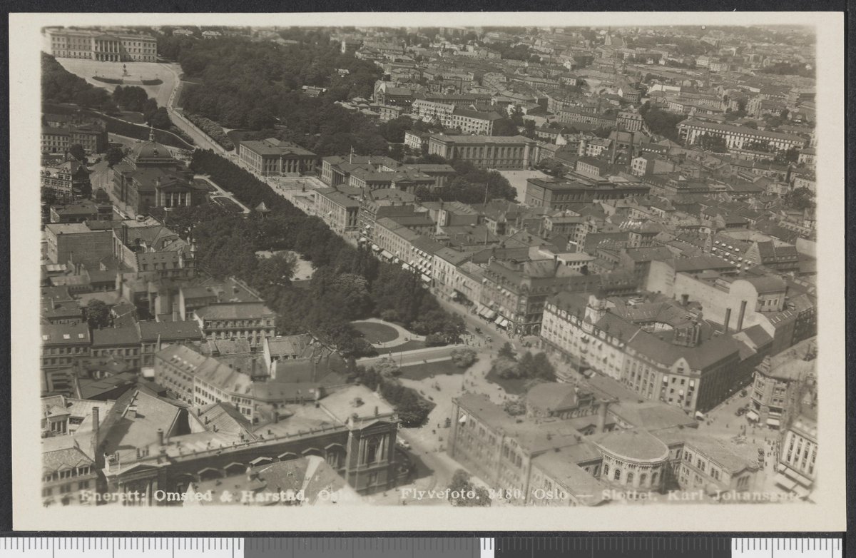 Aerial view of Karl Johans gate street in Oslo featuring Nationaltheatret, Stortinget, and Studenterlunden