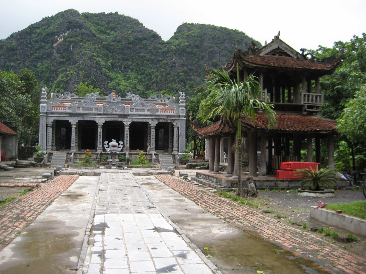 View of Thai Vi Palace in Vietnam, traditional wooden architecture with intricate roof details