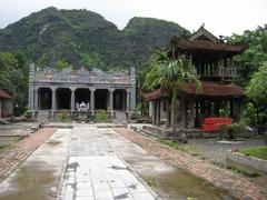 View of Thai Vi Palace in Vietnam, traditional wooden architecture with intricate roof details