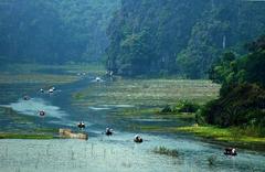 Scenic landscape of Tam Cốc-Bích Động with limestone karsts and river in Ninh Binh, Vietnam
