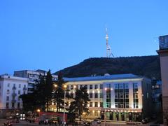 Tbilisi Public School 51 on Melikishvili Street with Mt. Mtatsminda and Tbilisi TV Tower in the background