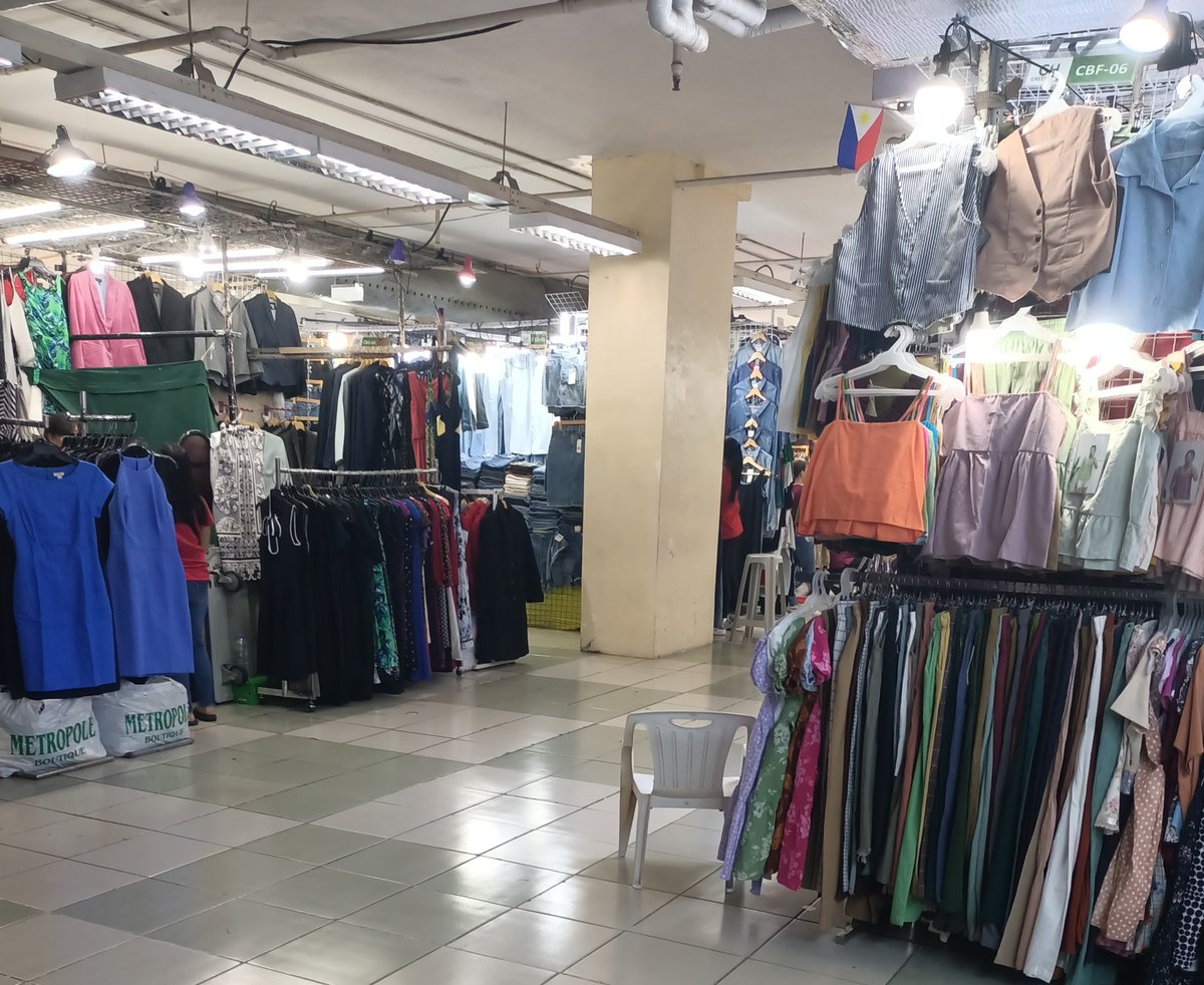 Clothes stall at Greenhills Shopping Center showing a variety of colorful clothes on display