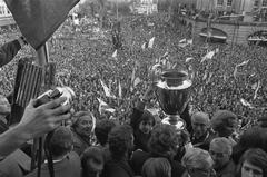 Ajax player Johan Cruijff and Mayor Ivo Samkalden holding the cup during the celebration balcony event in Amsterdam after winning the 1972 European Cup final