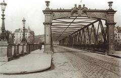 Wittelsbacherbrücke bridge over the Isar river in Munich with historical architecture and river view