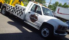 Vintage GMC C/K tow truck at Auto classique Showtime Muscle Cars event in Laval, Quebec