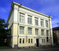 Finnish Architecture Museum building in Helsinki with classical facade and statues on roof