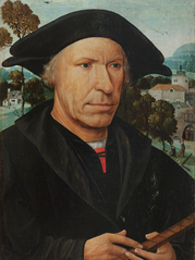 Portrait of an elderly man holding a tally stick in historical attire