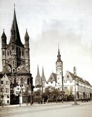 Historic view of Cologne's Fischmarkt with Romanesque church Groß St. Martin and medieval Stapelhaus around 1900, with Cologne Cathedral in the background