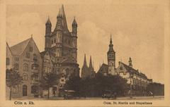 Historic view of Cologne Fischmarkt with Groß St. Martin Church, medieval Stapelhaus, and Cologne Cathedral in the background around 1900