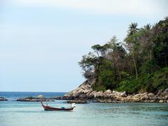 Kata beach with clear blue water and sandy shore in Phuket, Thailand