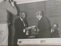 Dr. Aly Sadek Abou-Heif receiving the 1981 UNESCO Prize for the Teaching of Human Rights from Director-General Amadou-Mahtar M'Bow