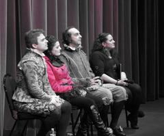 Actors on stage during 2014 Morfeo Teatro's performance of La Escuela de Los Vicios answering audience questions