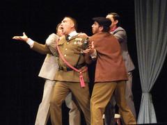 Actors performing on stage in Cambalache and ESAD de Murcia production El Secreto a Voces