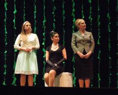 Actors performing on stage in a theatrical play