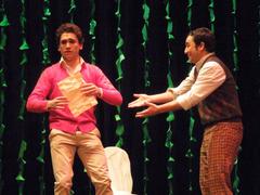 Actors performing on stage in the play De Fuera Vendra... Quien de Casa Nos Echara by Cambalache and ESAD