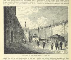 Historic black and white image of London's cityscape showing buildings and streets