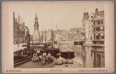Amstel River view from Halvemaansbrug towards Muntplein with Munttoren and hotel Rondeel tower, Amsterdam 1888