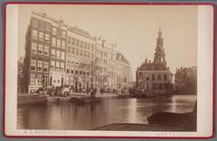 View of the Singel canal towards the Munttoren before the demolition of the Muntgebouw in 1884 with the entrance of the Eerste Klooster and houses Singel 461-475 on the left