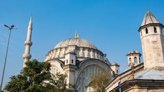 Nuruosmaniye Mosque exterior view with intricate architecture and clear sky