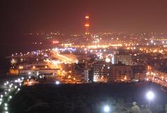 Night cityscape of Tel Aviv with illuminated buildings and streets