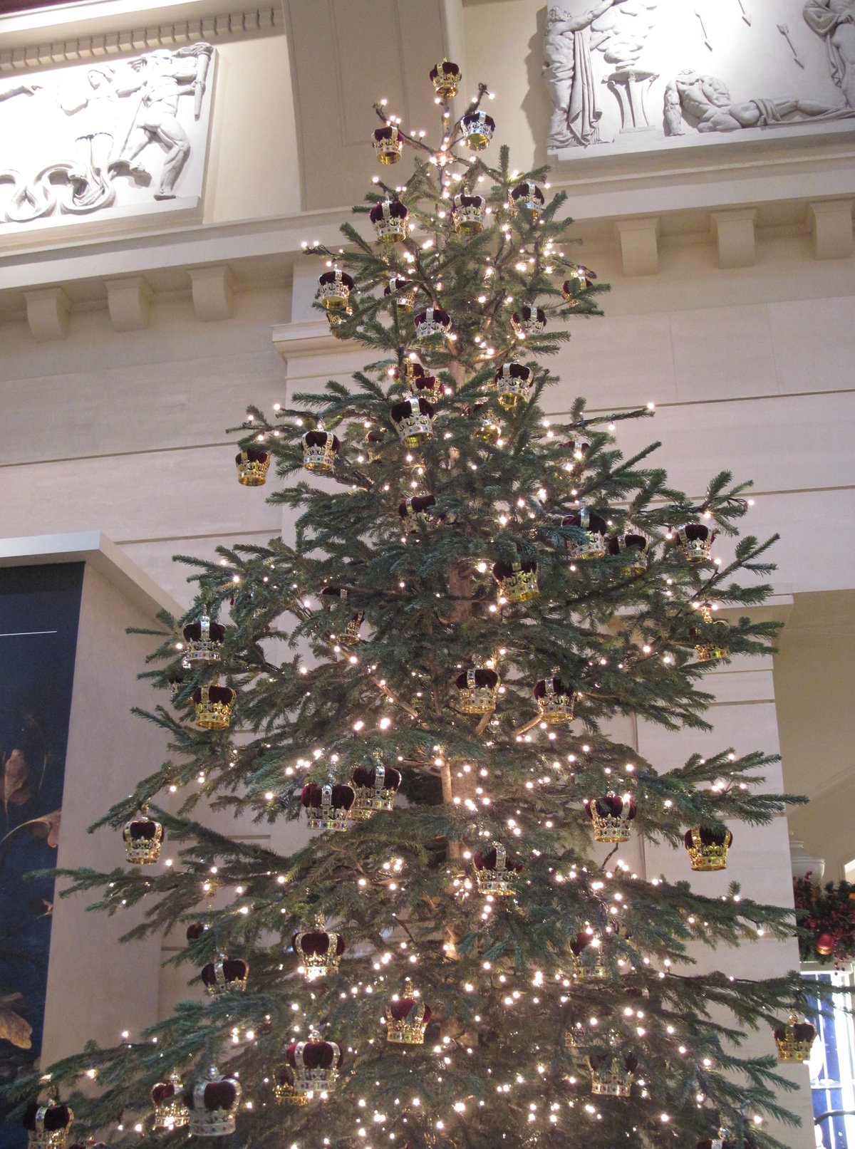 Christmas tree decorated with lights and ornaments at the Queen's Gallery, Buckingham Palace, London 2012