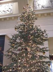 Christmas tree decorated with lights and ornaments at the Queen's Gallery, Buckingham Palace, London 2012