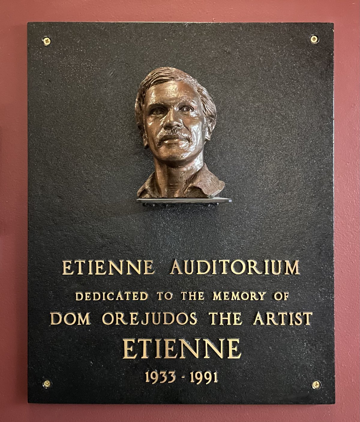 Memorial plaque dedicating the Leather Archives & Museum's auditorium to Dom Orejudos Etienne