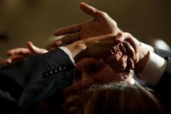 President Barack Obama greeting guests at a Democratic campaign reception