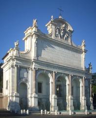 Large historic fountain known as Fontanone dell'Acqua Paola in Rome with water flowing and built on a hill