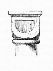 Stone cube capital with intricate carvings from St. George, Prague Castle