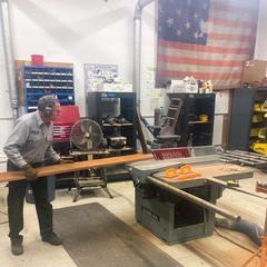 NPS employee named Bob working inside Fort McHenry maintenance building on a project