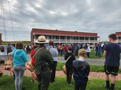 Fife and Drum rehearsal musical performance with Fort McHenry Guard and onlookers during flag change