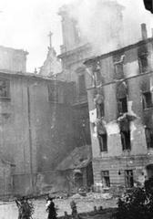 South wall of Holy Cross Church and burnt Police Station building at Krakowskie Przedmieście street during Warsaw Uprising