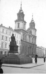 Warsaw street scenes showing war damage with Church of the Holy Cross and Nicolaus Copernicus monument