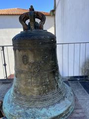 Porto Cathedral bell close-up under clear sky