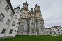 Exterior view of Stiftskirche St. Gallus und Otmar church in St. Gallen with a blue sky