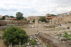 View of the Acropolis in Athens, Greece with ancient ruins and blue sky
