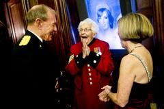 U.S. Army Gen. Martin E. Dempsey and his wife Deanie talking with British pensioner Dorothy Hughes at Royal United Services Institute conference 2011