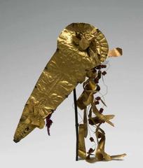 Golden hair accessory with dangling flower ornaments from Indonesian cultural heritage