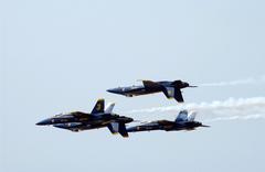 Blue Angels Navy Flight Demonstration Team performing Double Farvel maneuver at Elmendorf Air Force Base Alaska