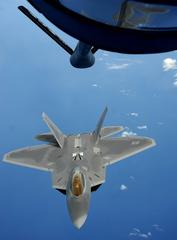 F-22 Raptor receiving fuel from KC-135 Stratotanker over Pacific Ocean