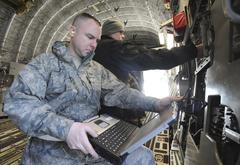 U.S. Air Force Staff Sgt. Carl Wesley reviewing aircraft ramp opening procedures during Red Flag-Alaska 09