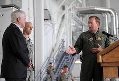 U.S. Air Force Lt. Gen. Dana T. Atkins thanking U.S. Defense Secretary Robert M. Gates at Elmendorf Air Force Base