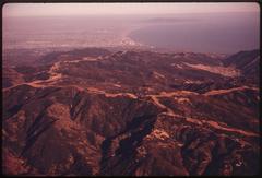 Aerial view of the Santa Monica Mountains looking south near Malibu, California with a cleared fire break area