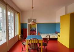 Children's room in Villa Müller interior with colorful walls and beds