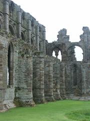 Ruins of Whitby Abbey in England under a blue sky