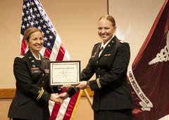 Second Lt. Kelsey N. Brokob receiving certificate at William Beaumont Army Medical Center CNTP graduation ceremony