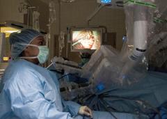 Surgeon performing robotic surgery at William Beaumont Army Medical Center